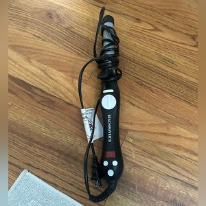 Beachwaver S1 rotating curling iron in Black
